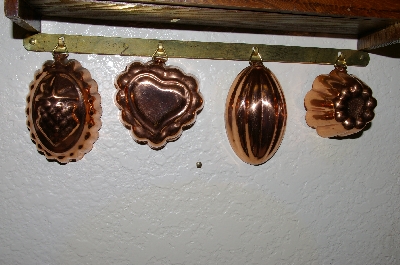 +MBA #70-8069  "35 Year Old 5 Piece Set Of 4 Small Jello Molds With Brass Hanging Rod