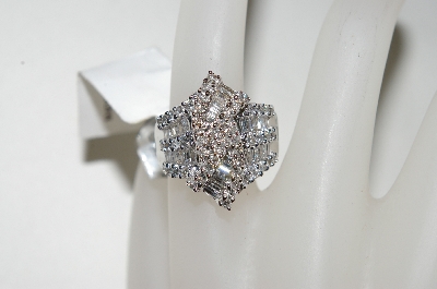 +MBA #76-089  14K White Gold Diamond Ribbon Ring