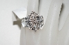 +MBA #76-089  14K White Gold Diamond Ribbon Ring
