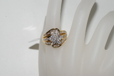 +MBA #76-041  10K Yellow Gold Center Flower Diamond Ring