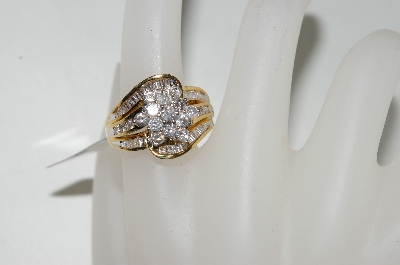 +MBA #76-041  10K Yellow Gold Center Flower Diamond Ring