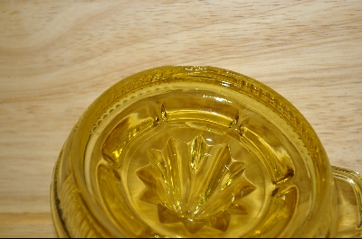 +MBA #5498  "Amber  Glass Reamer #5498