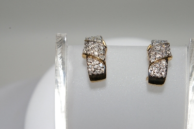 +MBA #78-025     14K Yellow Gold Cross Over Diamond Earrings