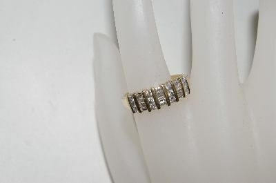 +MBA #78-042   14k Yellow Gold Round & Baguette Diamond Ring