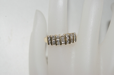 +MBA #78-042   14k Yellow Gold Round & Baguette Diamond Ring