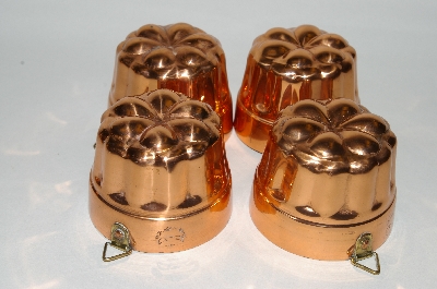 +MBA #79-026   Set Of 4 "AURUS" Copper Jello Molds