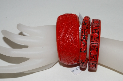 +MBA #82-025   Set Of 3 Red Cinnabar Hand Carved Bangle Bracelets