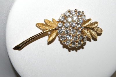 +MBA #87-318  "Trifari Gold Tone Crystal Rhinestone Flower Brooch