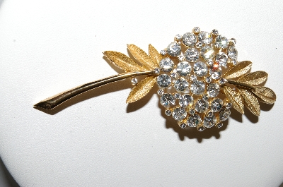 +MBA #87-318  "Trifari Gold Tone Crystal Rhinestone Flower Brooch