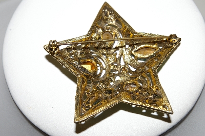 +MBA #87-210  Vintage Gold Tone Green Rhinestone "Star" Brooch