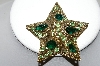 +MBA #87-210  Vintage Gold Tone Green Rhinestone "Star" Brooch