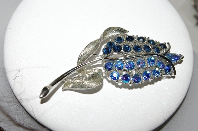 +MBA #87-292  "Lisner AB & Blue Rhinestone Flower Brooch