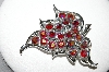 +MBA #87-301   Sarah Coventry Silvertone Red AB Crystal Fancy Leaf Brooch