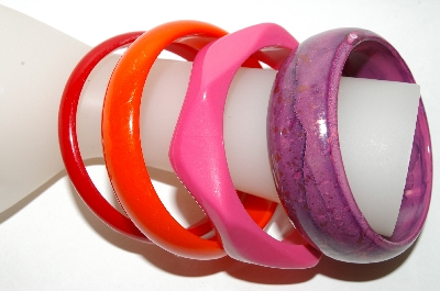 +MBA #88-010   Set Of 4 Multi Colored Lucite Bangle Bracelets