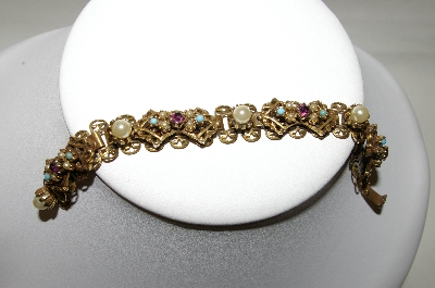 +MBA #88-072   Gold Plated Purple Rhinestone & Faux Pearl Bracelet