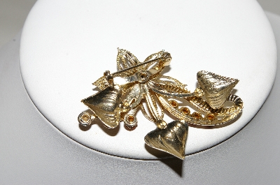 +MBA #87-070   Gold Tone Red Rhinestone Flower Pin