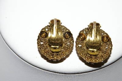 +MBA #87-042   Made In West Germany Gold Tone Red Rhinestone Clip On Earrings