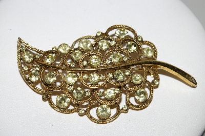 +MBA #92-010  "Vintage Goldtone Light Green Rhinestone Leaf Brooch"