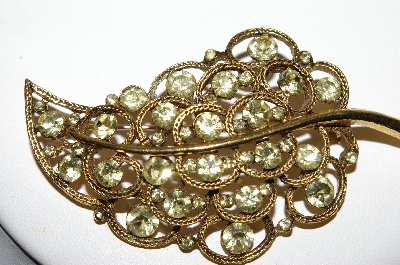 +MBA #92-010  "Vintage Goldtone Light Green Rhinestone Leaf Brooch"