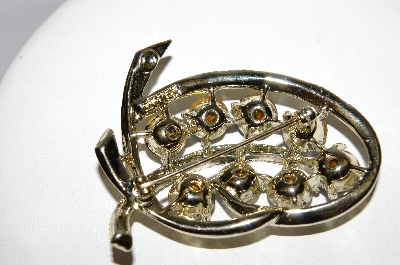 +MBA #92-096 "Kramer Goldtone Blue Rhinestone Swirl Brooch"