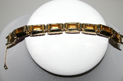 +MBA #97-033 "Zentall Goldtone Large Emerald Cut Purple Glass Bracelet"