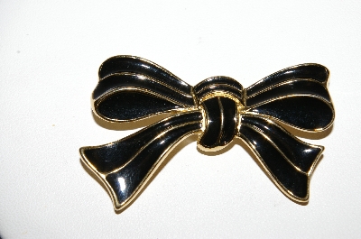 +MBA #97-003 "Trifari Goldtone Black Enameled Bow Brooch"