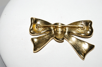 +MBA #97-003 "Trifari Goldtone Black Enameled Bow Brooch"