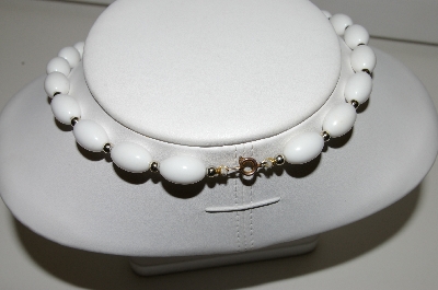 +MBA #94-304  "Napier Goldtone White Bead Necklace With Enameled Center Piece"