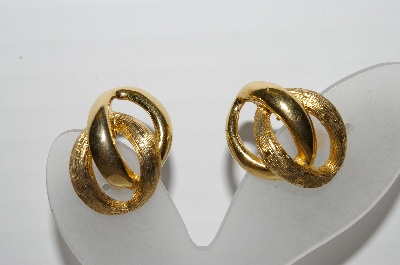+MBA #93-023  "Napier Goldtone Interlocking Clip On Earrings"