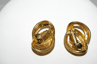 +MBA #93-023  "Napier Goldtone Interlocking Clip On Earrings"