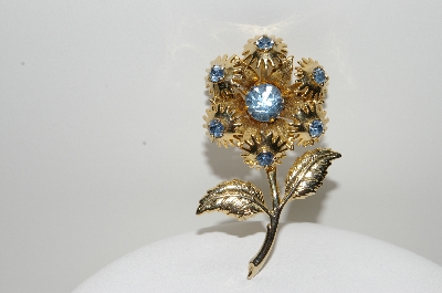 +MBA #99-398  "Vintage Goldtone Blue Crystal Rhinestone Flower Pin"