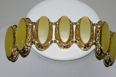 +MBA #99-042  "Vintage Goldtone Large Yellow Thermoset Bracelet"