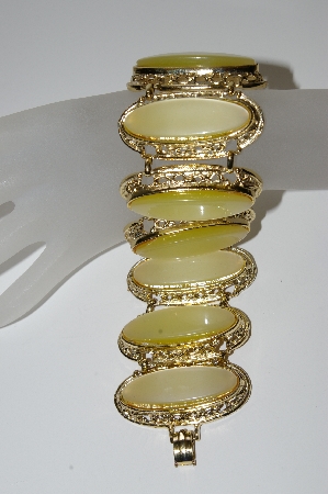 +MBA #99-042  "Vintage Goldtone Large Yellow Thermoset Bracelet"