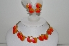 +MBA #99-052  "Vintage Goldtone Two Shades Of Orange Thermoplastic Necklace & Earrings Set"
