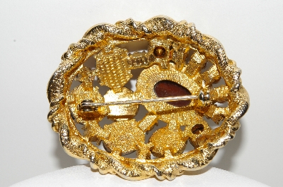 +MBA #E43-041  "Vintage Goldtone Brown Glass & Rhinestone Pin"
