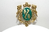 **MBA #E44-222   "Vintage Gold Filled Green Enameled Shield/Crest Pin"