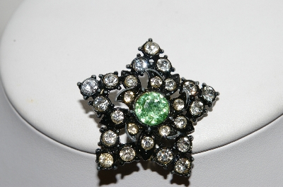 **MBA #E44-112   "Vintage Black Metal Rhinestone Star Pin"