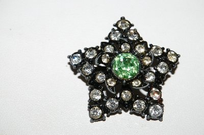 **MBA #E44-112   "Vintage Black Metal Rhinestone Star Pin"