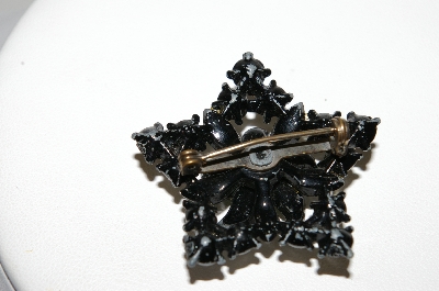 **MBA #E44-112   "Vintage Black Metal Rhinestone Star Pin"