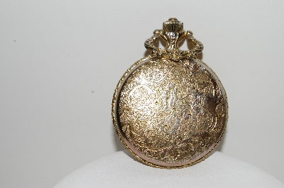 +MBA #E44-011   "Futura Gold Tone Train Pocket Watch"