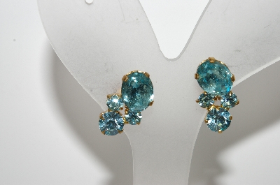 +MBA #E45-049   "Vintage Made In Austria Gold Tone Blue Crystal Rhinestone Screw Back Earrings"