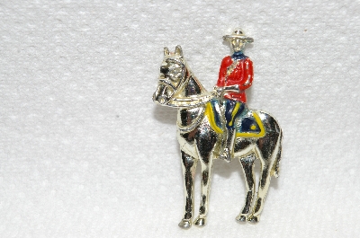 **MBA #E48-174  "Vintage Gold Tone Enameled Mounted Police Pin"
