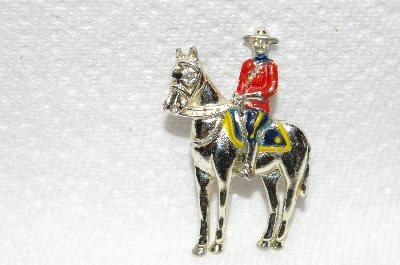**MBA #E48-174  "Vintage Gold Tone Enameled Mounted Police Pin"