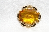 **MBA #E48-262   "Vintage Gold Tone Citrine Colored Glass Stone Pin"