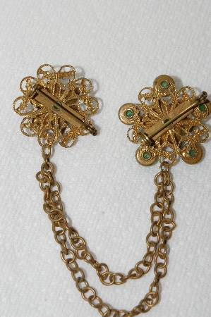 **MBA #E48-097   "Vntage Goldtone Green Stone Double Sweater Pin Set"
