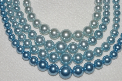 +MBA #E49-187   "Vintage 4 Strand Blue Faux Pearl Necklace"
