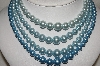 +MBA #E49-187   "Vintage 4 Strand Blue Faux Pearl Necklace"