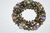 **MBA #E50-277   "Vintage Antiqued Gold Tone AB Crystal Rhinestone Floral Pin"