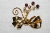 +MBA #E52-184   "Coro Gold Tone Purple Rhinestone & Faux Pearl Fancy Bow Pin"