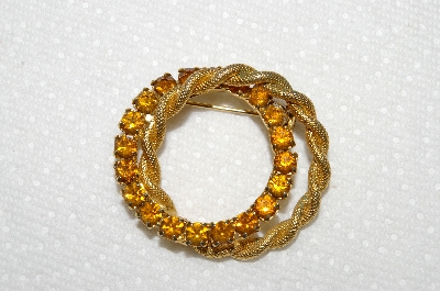 **MBA #E52-132   "Vintage Gold Plated Citrine Colored Rhinestone Double Circle Pin"